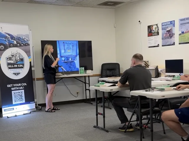 All-In CDL instructor teaching a live classroom session to students